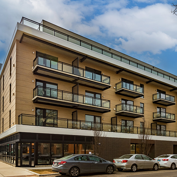 Luxury mixed-use building at 2407 W. Eastwood sold by Chicago commercial real estate brokers, at Essex Realty Group.