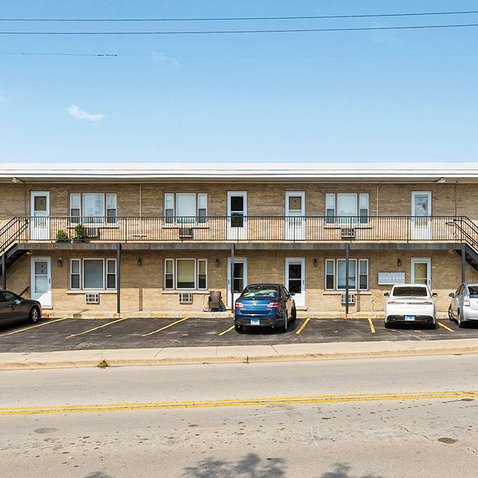 8-unit multifamily property at 1324 East Roosevelt Road in Wheaton, Illinois, sold by Essex Realty Group Brokers.